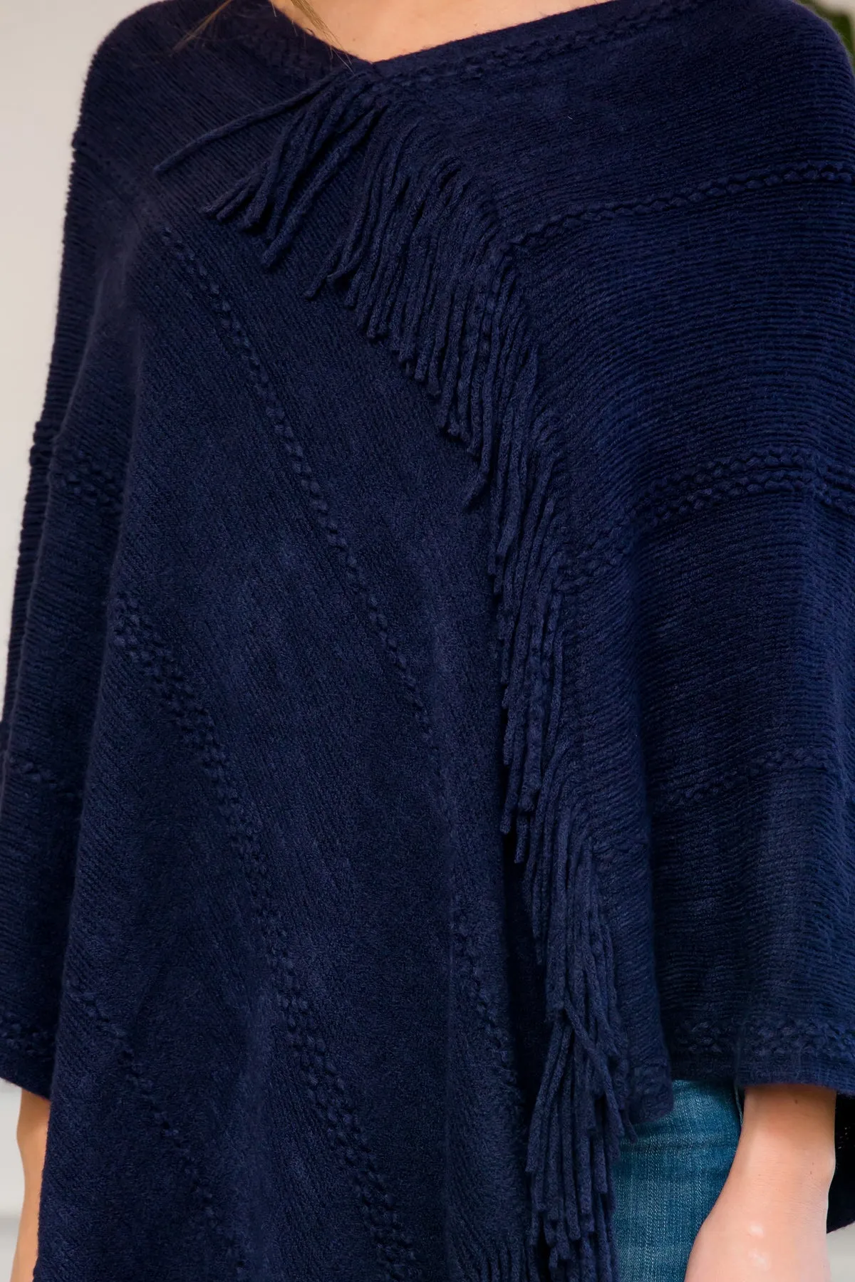 ASYMMETRIC FRINGE PONCHO